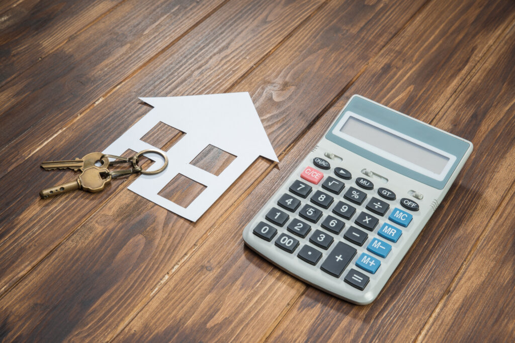 A House and Keys With Calculator